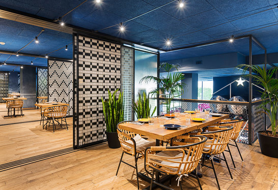 Restaurant Setting with Heradesign Solutions from Knauf Ceiling Solutions Installed
